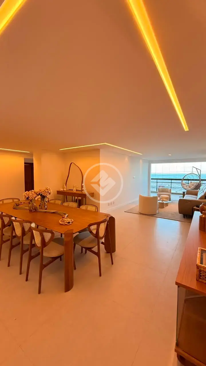 Sala de estar e jantar integradas com acabamento de alto padrão