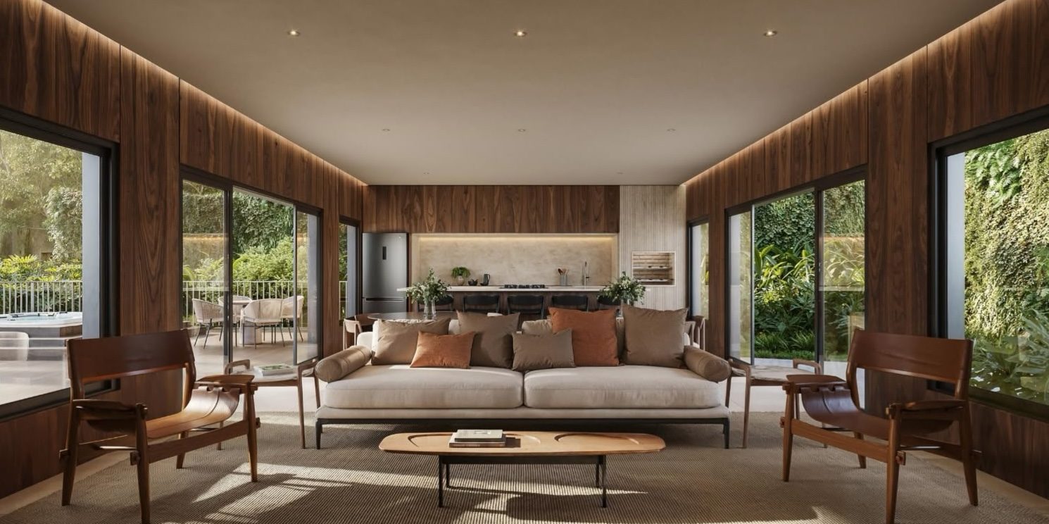 Salão do espaço gourmet com spa do Abitte Piemonte, em madeira, com vista para o jardim
